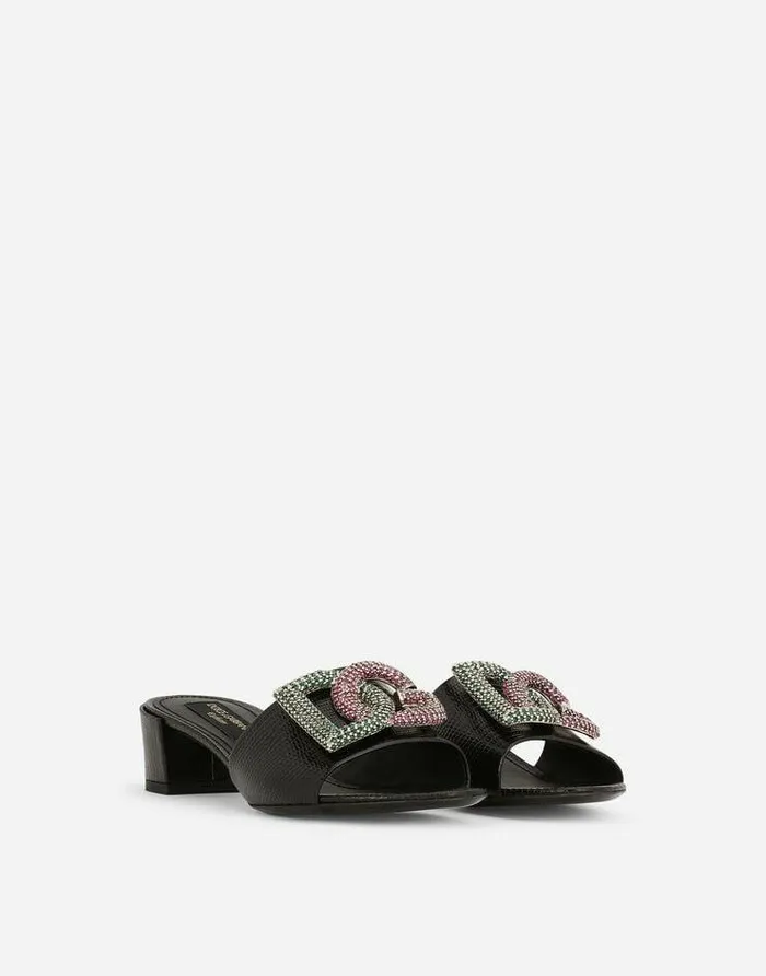 Dolce and Gabbana Slides And Mules Women Iguanaprint Calfskin Mules With Rhinestonedetailed DG Logo Black Dolce and Gabbana Slides And Mules Women Iguanaprint Calfskin Mules With Rhinestonedetailed DG Logo Black