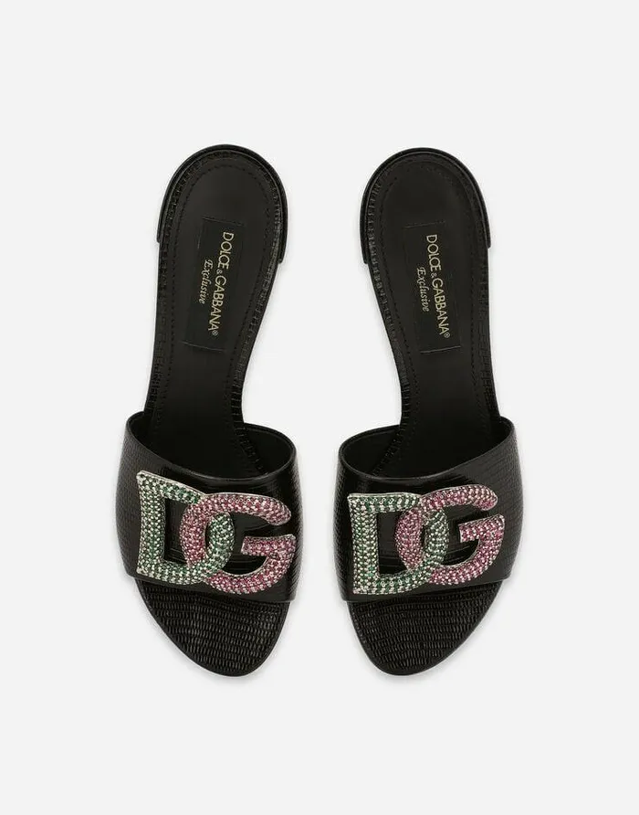 Dolce and Gabbana Slides And Mules Women Iguanaprint Calfskin Mules With Rhinestonedetailed DG Logo Black Dolce and Gabbana Slides And Mules Women Iguanaprint Calfskin Mules With Rhinestonedetailed DG Logo Black