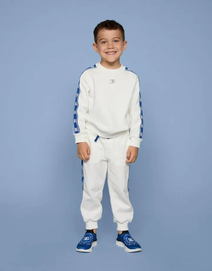 Dolce and Gabbana Trousers And Shorts Children Jersey Jogging Pants With DG Logo Band White Dolce and Gabbana Trousers And Shorts Children Jersey Jogging Pants With DG Logo Band White