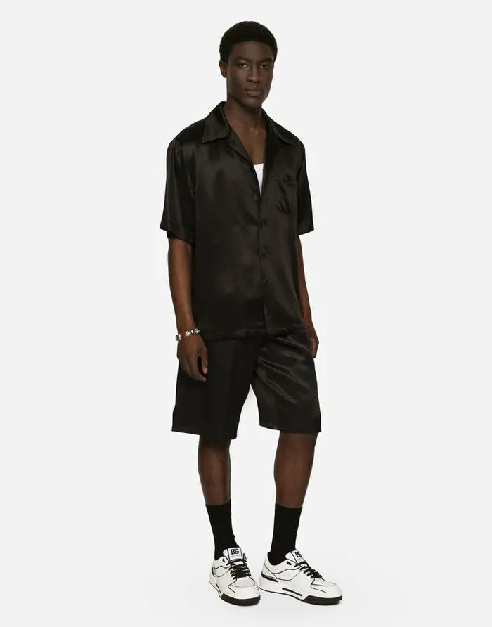 Dolce and Gabbana Trousers And Shorts Men Silk Satin Jogging Shorts With Metal DG Logo Black Dolce and Gabbana Trousers And Shorts Men Silk Satin Jogging Shorts With Metal DG Logo Black