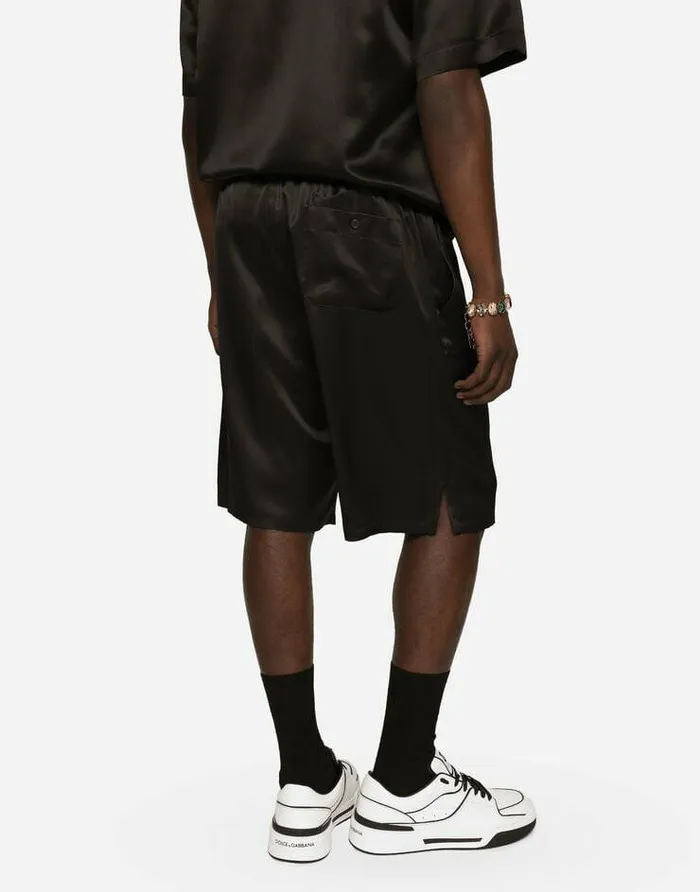 Dolce and Gabbana Trousers And Shorts Men Silk Satin Jogging Shorts With Metal DG Logo Black Dolce and Gabbana Trousers And Shorts Men Silk Satin Jogging Shorts With Metal DG Logo Black