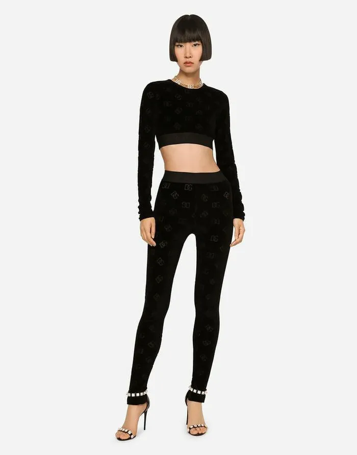 Dolce and Gabbana Trousers And Shorts Women Flocked Jersey Leggings With Allover DG Logo Black Dolce and Gabbana Trousers And Shorts Women Flocked Jersey Leggings With Allover DG Logo Black