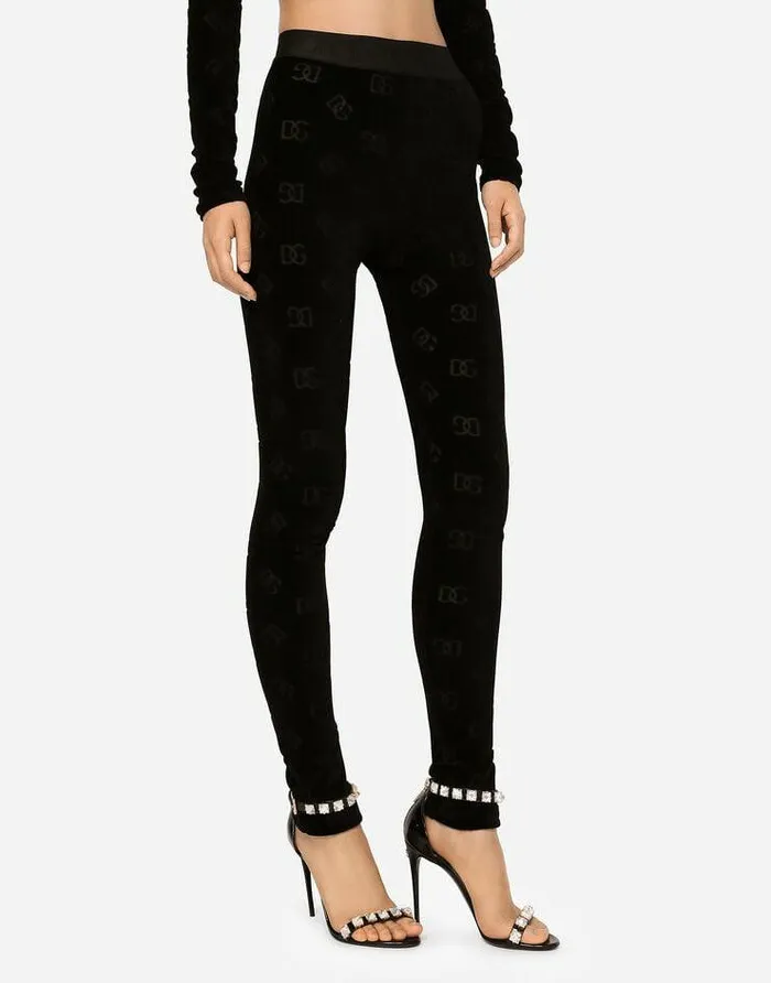 Dolce and Gabbana Trousers And Shorts Women Flocked Jersey Leggings With Allover DG Logo Black Dolce and Gabbana Trousers And Shorts Women Flocked Jersey Leggings With Allover DG Logo Black