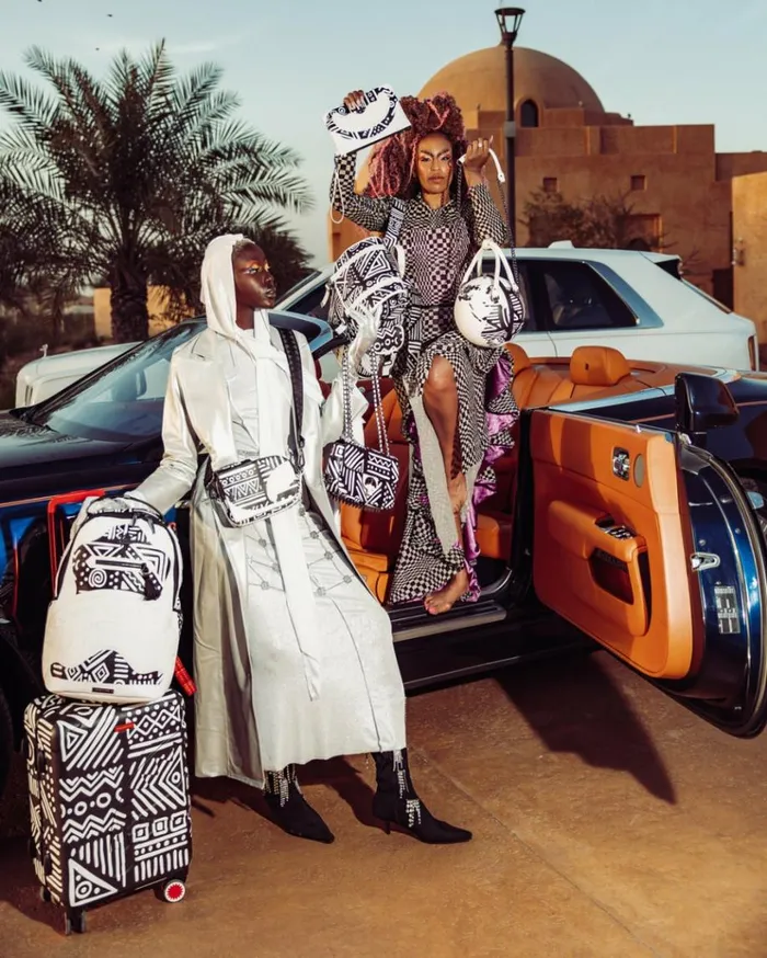 SPRAYGROUND AI8 AFRICAN INTELLIGENCE 8211 ORIGIN STORY BACKPACK SLING Bags