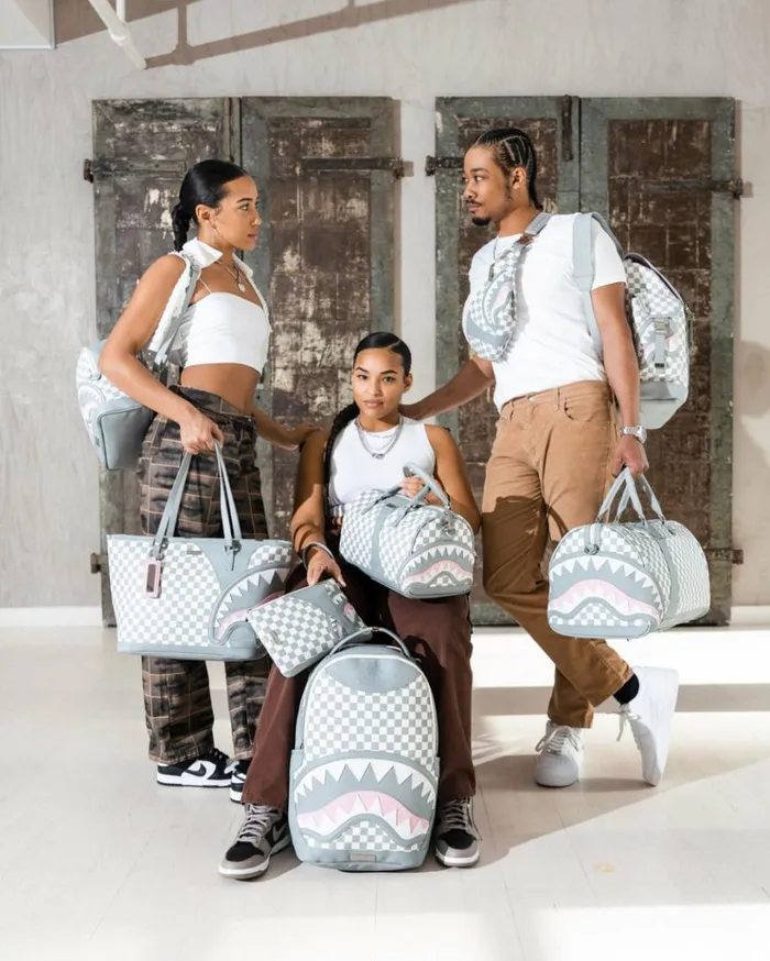 SPRAYGROUND AIR TO THE THRONE JETSET CROSSOVER CLUTCH Bags