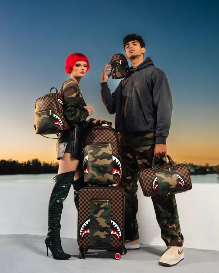SPRAYGROUND EXTERIOR GOLD ZIP POCKET SHARKS IN PARIS SAVAGE BACKPACK Bags